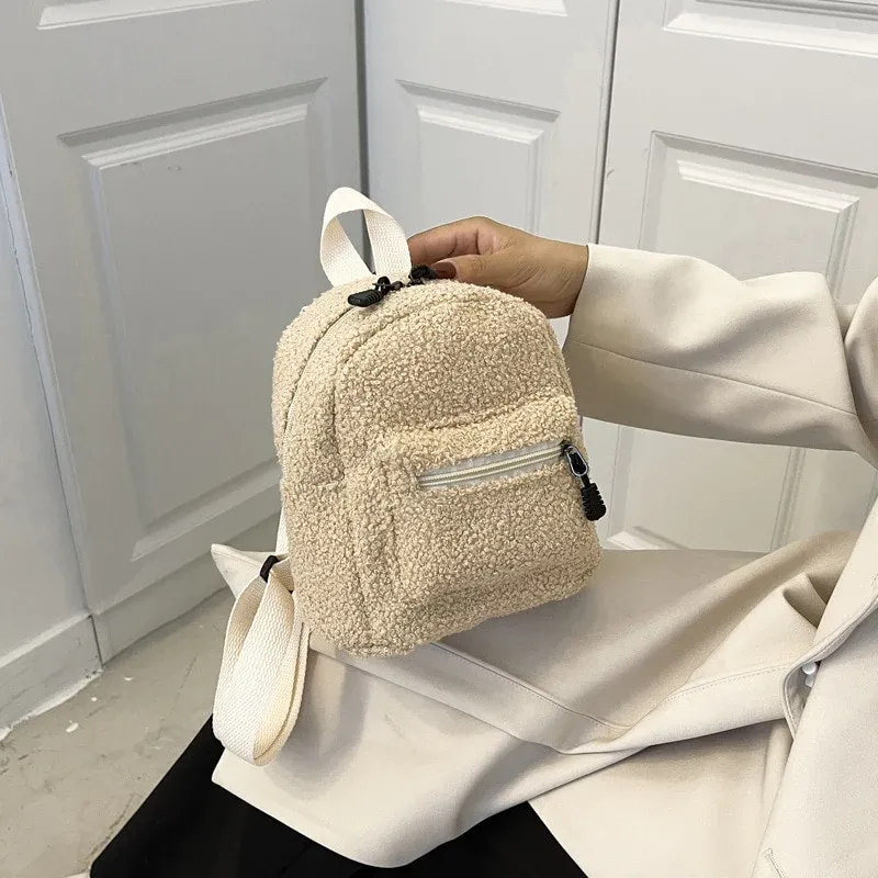 Curated home and lifestyle gadgets collection - cozy shelf with plush backpack and decor